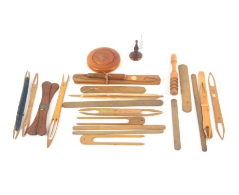 A collection of boxwood netting tools, a circular boxwood darner, 8cms, a folding rosewood X frame winder, 16.2cms, and a box