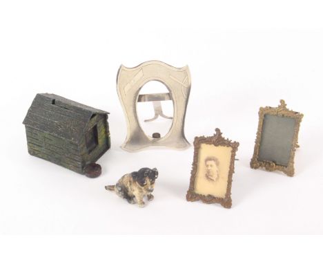 A mixed lot, comprising a soft metal cold painted inkwell in the form of a dog kennel with attendant dog, 9cms, a white metal