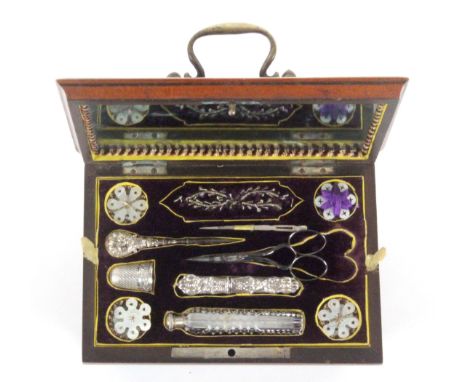 A Palais Royal satinwood sewing box, circa 1840, the bombe sides below a moulded lid with central burr panel mounted with a b