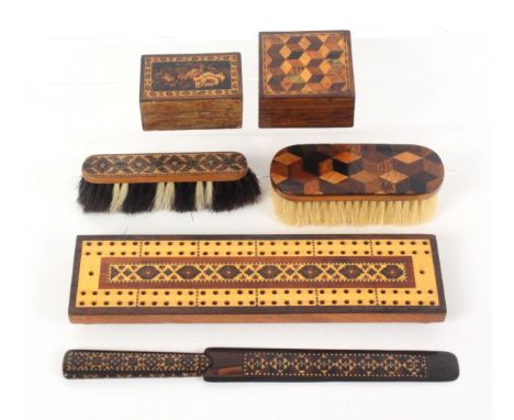 Tunbridge ware - six pieces, comprising a mosaic inlaid cribbage board, 23.5cms, a rosewood mosaic inlaid paper knife, 24.5cm
