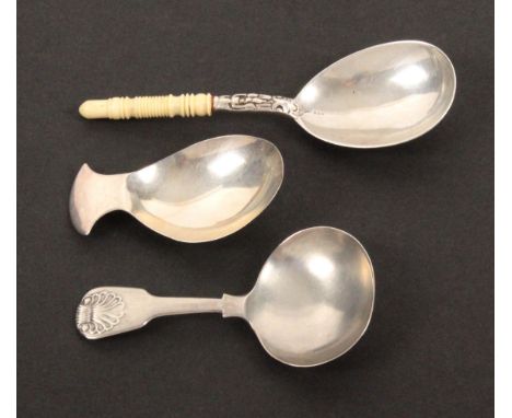Three silver caddy spoons, comprising an oval bowl example with curved handle, London 1807, makers mark probably 'IS', 6.4cms