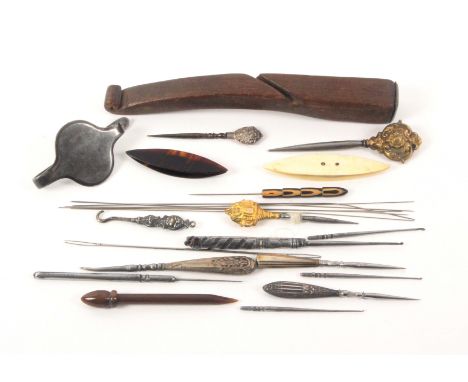 A mixed lot - sewing, comprising a plain mahogany knitting stick, 17cms, a group of fine gauge knitting needles, two shuttles