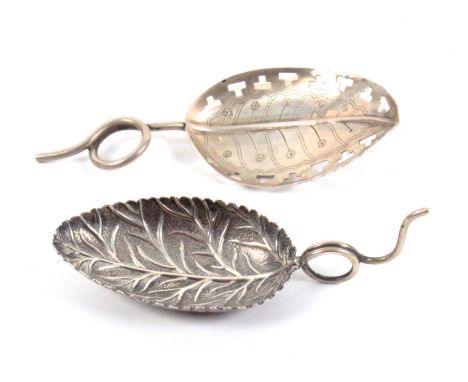 Two silver leaf bowl caddy spoons, one with leaf engraved bowl and pierced border to a wire work handle, Birmingham, 1808, Br