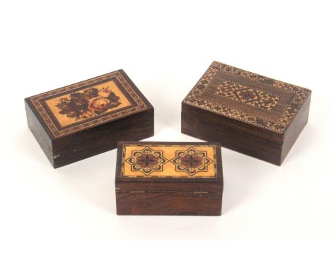 Three small Tunbridge ware rectangular rosewood boxes, all pull-off lids comprising a rectangular example, the lid with unusu