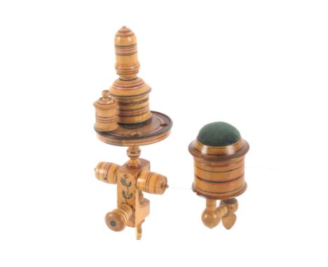 Two early painted Tunbridge ware white wood sewing clamps, comprising a floral and ring painted example, the clamp with thimb