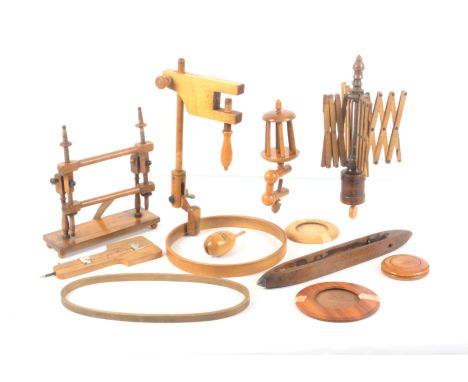 A mixed lot - wooden sewing and crafts tools, comprising a small embroidery frame, 22cms, another circular on clamp frame, a 