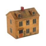 An early painted Tunbridge ware white wood cottage form sewing box, the front painted with a