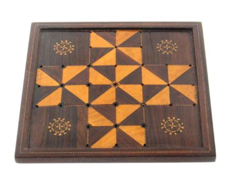 A scarce Tunbridge ware rosewood playing board for the game of 'Fox And The Geese', the geometric inlaid board with four stic