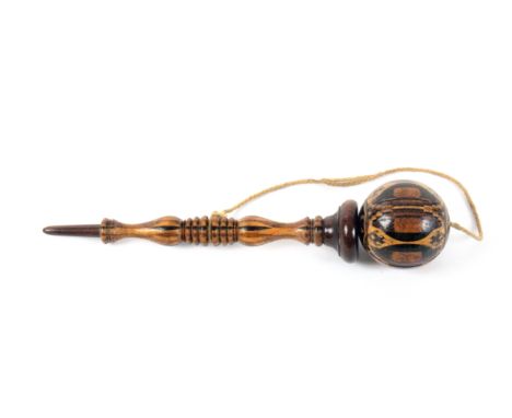A rare Tunbridge ware, bilboquet or cup and ball, the stem in stick ware with rosewood ball mount, the stick ware ball restin