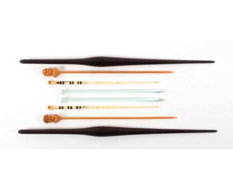 Four pairs of knitting needles, comprising a rare 'Scrimshaw' pair in whale bone and baleen with ring tops, splits caused by 