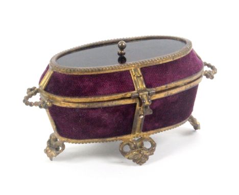 A charming French miniature sewing box for a child or doll, circa 1860, of oval form with gilt metal bandings, mounts and han