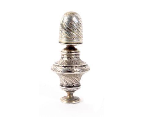 An 18th Century German silver standing thimble top sewing companion, the circular base with vase form vinaigrette below a tap