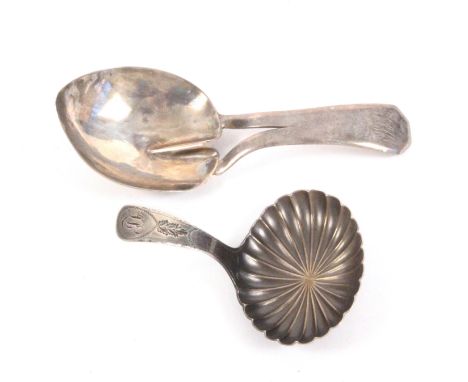 Two silver caddy spoons, comprising a plain leaf bowl example to a divided handle initialled 'JPW', London, 1829', makers mar