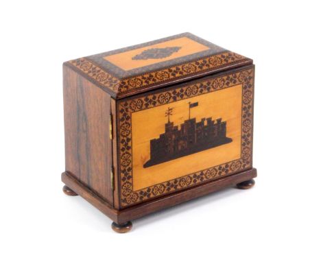 An attractive Tunbridge ware rosewood casket, the canted rectangular top with a geometric mosaic motif within borders of stic