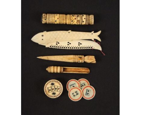 Five bone pieces, some probably French Prisoner of War work, comprising a stiletto with fist terminal, 10cms, a similar knife