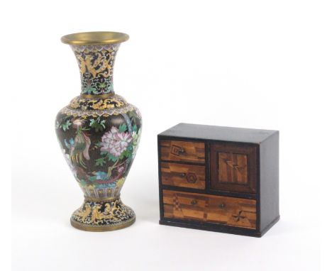 An oriental brass bodied cloissone vase, vividly decorated with an exotic bird and flowers, 31cms high and a miniature inlaid