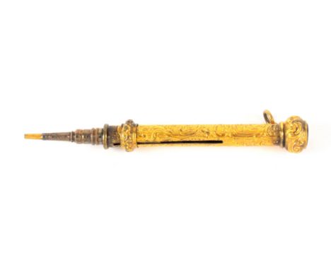 A mid 19th Century gilt metal retractable pencil, leaf scroll decorated cylinder, the ball top with ring suspension and inset