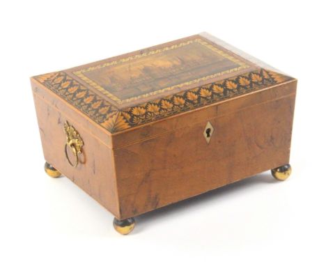 An early print and paint decorated Tunbridge ware sewing box in burr elm, of sarcophagol form, the lid with a colour print of