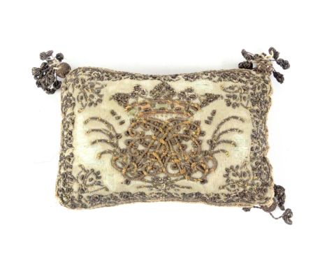 A 17th Century silk and metal thread embroidered pin cushion, circa 1660, one side with a monogram apparently 'AARR' below a 