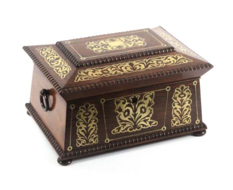 A rosewood and brass inlaid sewing box of sarcophagol form, circa 1860, the front and lid inlaid with floral cut brass, quart