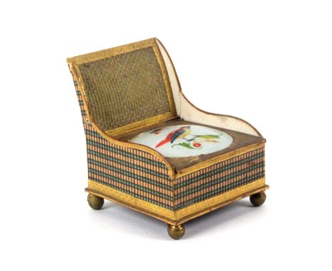 An unusual French bonbonniere in the form of a salon chair, executed in card, coloured paper and with raised gilt foil border