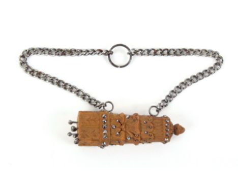 A fine carved walnut and cloute work pin poppet in the form of a quiver, with faceted top pins as the 'arrows', on steel chai