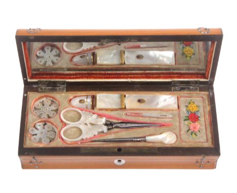 A good Palais Royal small format sewing box, circa 1840, the satinwood rectangular box with curved front and back below a dom