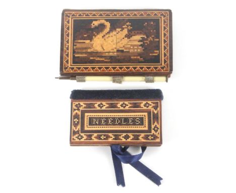Two Tunbridge ware needle books, comprising a large example, one cover with a mosaic panel of a swan, the other in cube work,