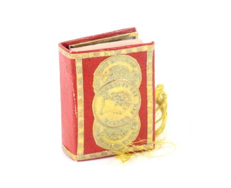A rare George III 'triple guinea' needle book and pin cushion of book form, the cover with three gilt foil guinea impressions