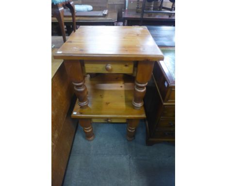 A pair of pine single drawer lamp tables 