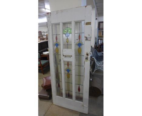 An Art Nouveau stained glass door 