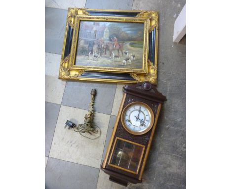 A hunting scene, oil on board, unsigned, a brass cherub table lamp and a 1930's oak wall clock 