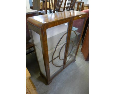 An Art Deco walnut display cabinet 