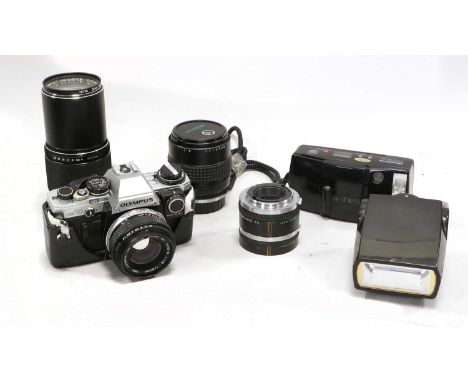 Olympus OM10 Camera with Zuiko f1.8 50mm lens; Zuiko Auto-T f4 200mm and Makinon f2.8 135mm lenses; an Olympus AF1 compact ca
