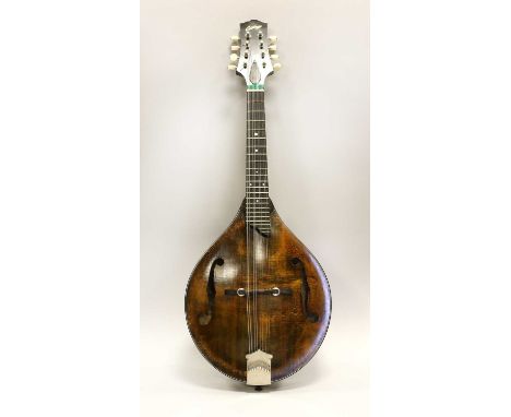 Mandolin Model MT ebony fingerboard, adjustable bridge, two f holes, labelled 'Collings Austin Texas #1178' with signature ac