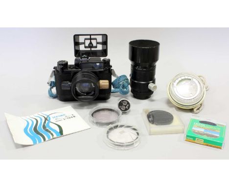 Nikonos-III Underwater Camera with W-Nikkor f2.5 35mm and Nikkor f4 80mm lenses; light meter and a few other items