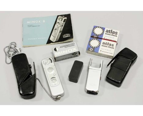 Minox B Camera (cased) with flash attachment with two bulbs and instructionsShutter appears to operate correctly