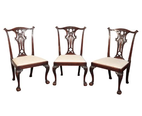 A SET OF SIX GEORGE II MAHOGANY DINING-CHAIRS Mid-18th century, after a design by Thomas Chippendale, each with serpentine to