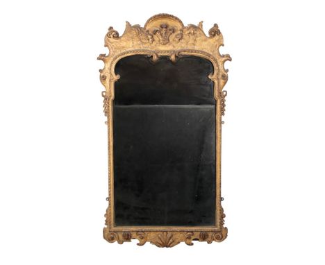 A GEORGE I GILTWOOD AND GILT-GESSO GIRANDOLE MIRROR Early 18th century, in the manner of James Moore, perhaps supplied by Ger