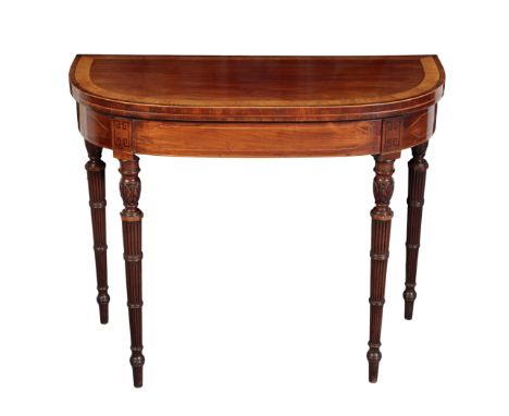 A REGENCY MAHOGANY D-SHAPED CARD-TABLE Early 19th century, the hinged top cross-banded in satinwood and rosewood, enclosing a