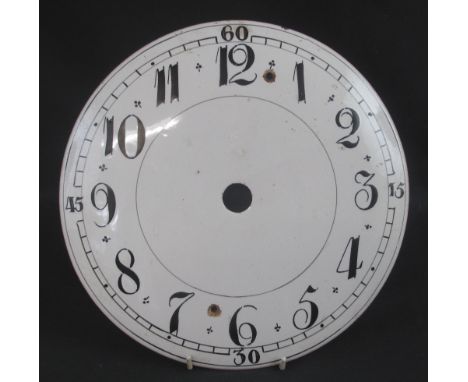 ENGLISH, TIN GLAZED, DELFT POTTERY CLOCK FACE, painted with Arabic numerals in black on a white ground.  25cm diameter.   CON