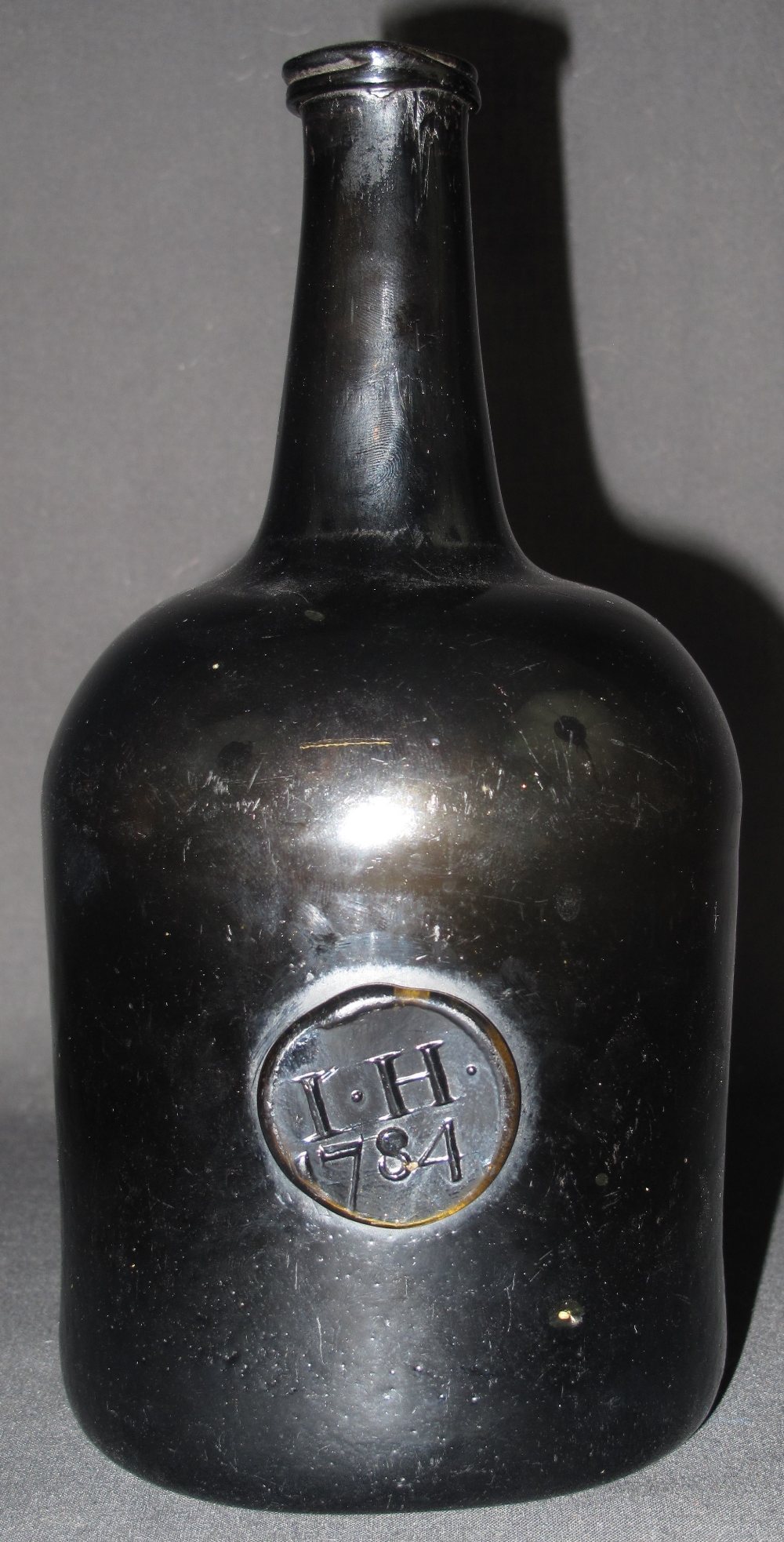 Late 18th Century Mallet Shaped Glass Sealed Wine Bottle The Seal With Initials Ih Dated 0697