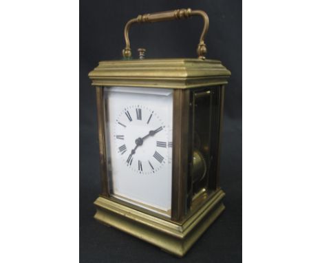 LATE 19TH CENTURY FRENCH BRASS REPEATING CARRIAGE CLOCK, having full depth enamel face with Roman numerals, the striking move