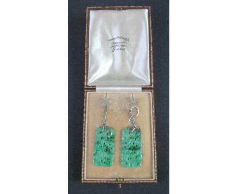 PAIR OF CHINESE CARVED JADE, PIERCED, RECTANGULAR SHAPED DROP EARRINGS with white metal suspension and hoops.  Boodle and Dun