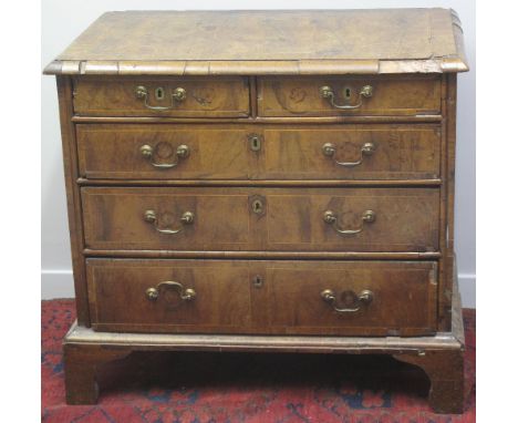 18TH CENTURY WALNUT STRAIGHT FRONTED CHEST of two short and three long drawers, the top with satinwood outlines and moulded e