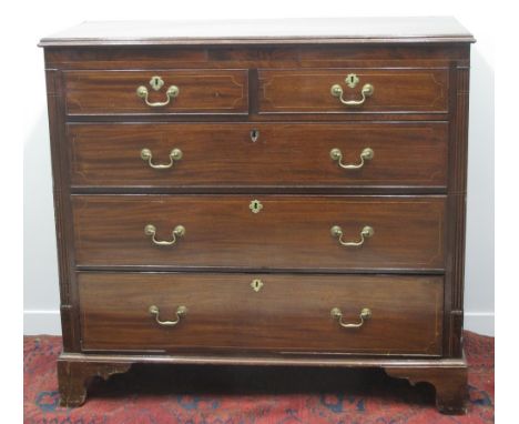 EARLY 19TH CENTURY MAHOGANY STRAIGHT FRONTED CHEST of two short and three long, graduated drawers, having moulded edged top, 
