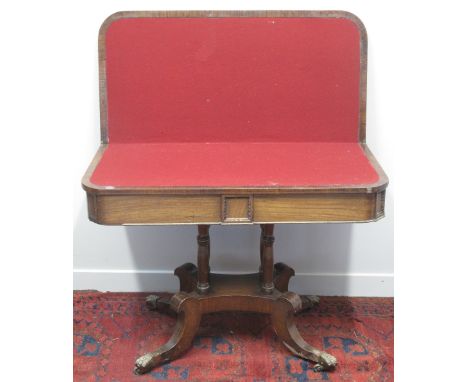 REGENCY ROSEWOOD RECTANGULAR FOLD OVER CARD TABLE, having ebony strung top with curved angles, revealing red baize playing su