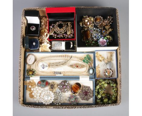 A collection of 1950's and later costume jewellery - mainly brooches. To include RAF and mother of pearl, polished stone, cer