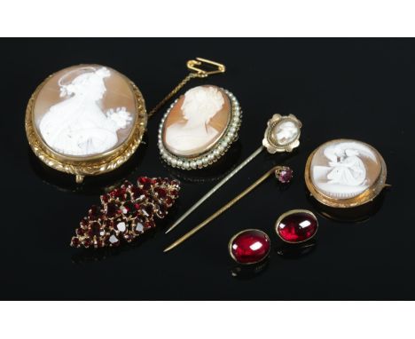 A collection of cameo and garnet jewellery. To include brooches, buttons and stick pins.  