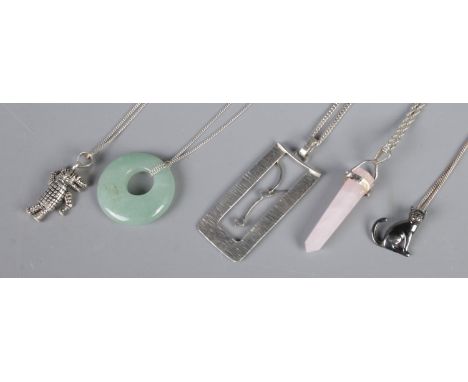 Five silver chains with pendants, to include rose quartz and cat examples.  